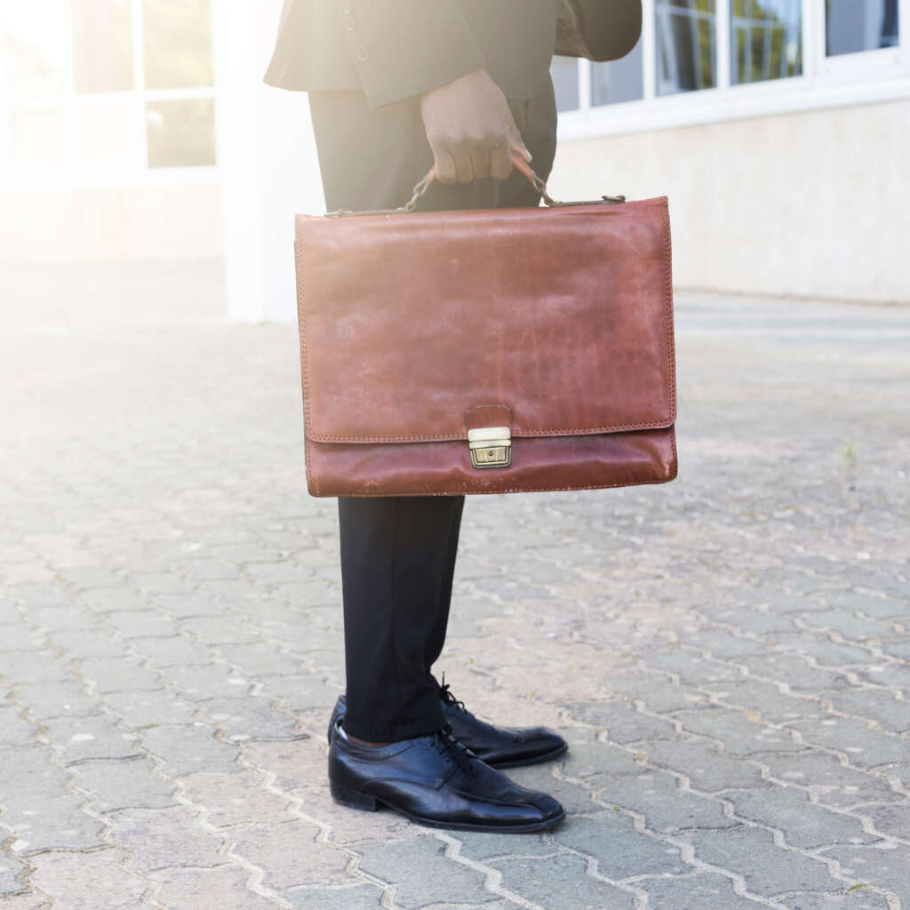 Image of an attorney holding a briefcase