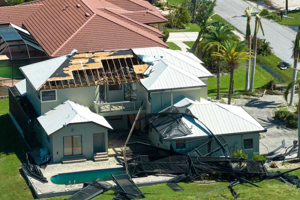 Arial image of a home that has been damaged by wind